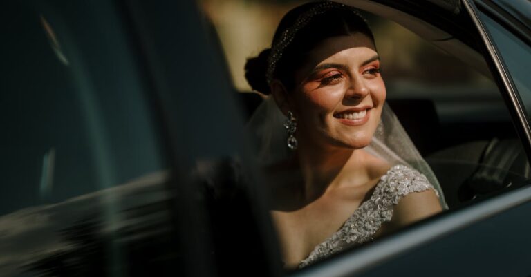 Smiling Bride Sitting in a Limousine