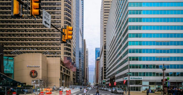 Vibrant cityscape of Philadelphia showcasing iconic skyscrapers and bustling streets.