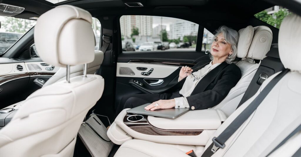 Senior woman relaxing in a luxurious car interior, enjoying the comfort and modern design.