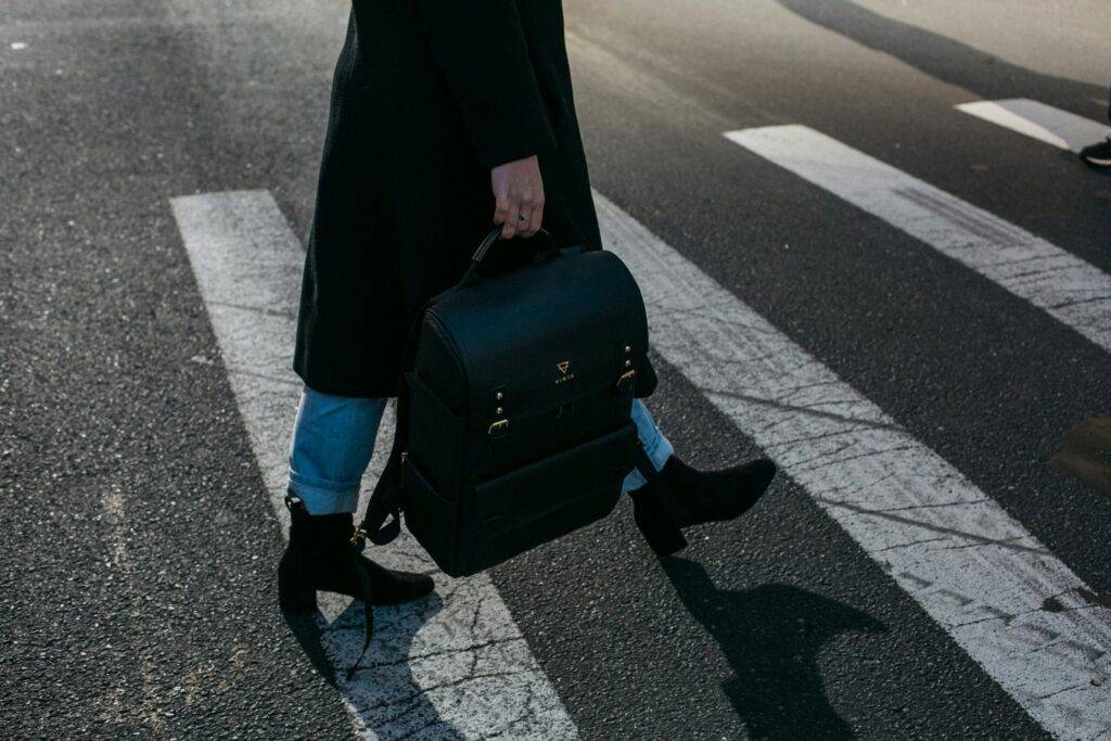 Woman Is Walking Toward All New York Car Service Woman Is Walking Toward All New York Car Service