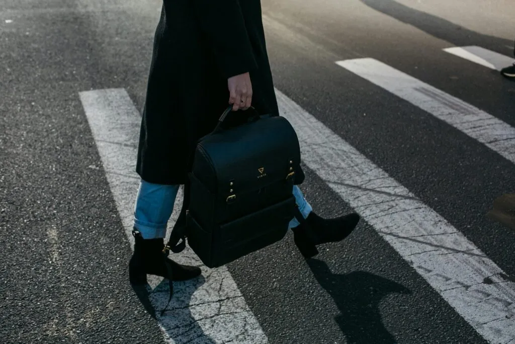 Woman is walking toward all new york car service