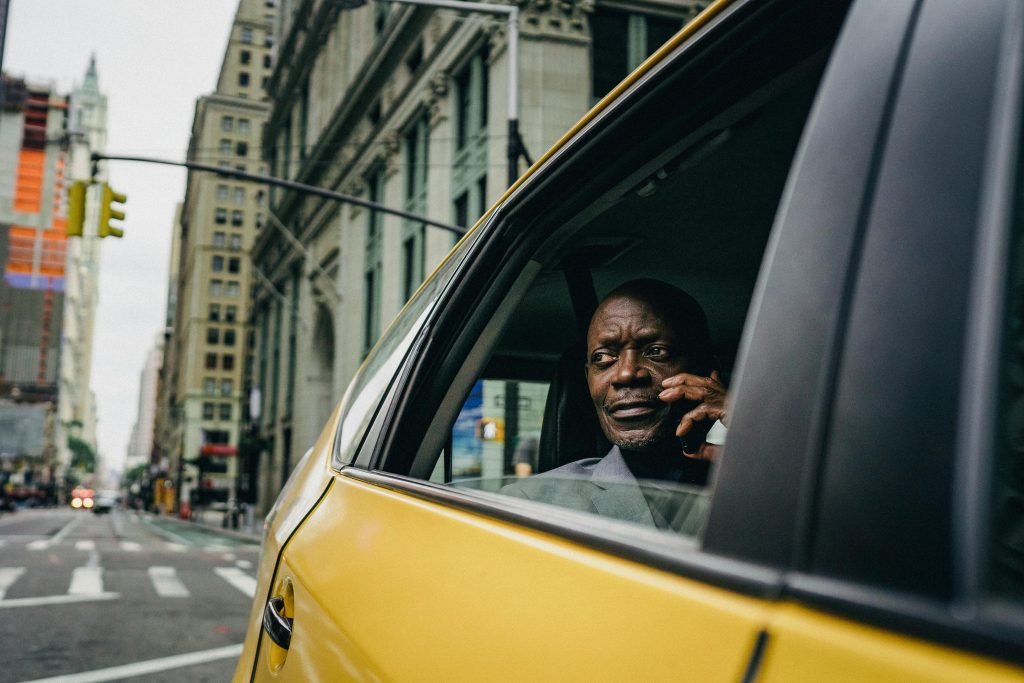 affordable taxi from JFK to Manhattan options at the official stand 2026