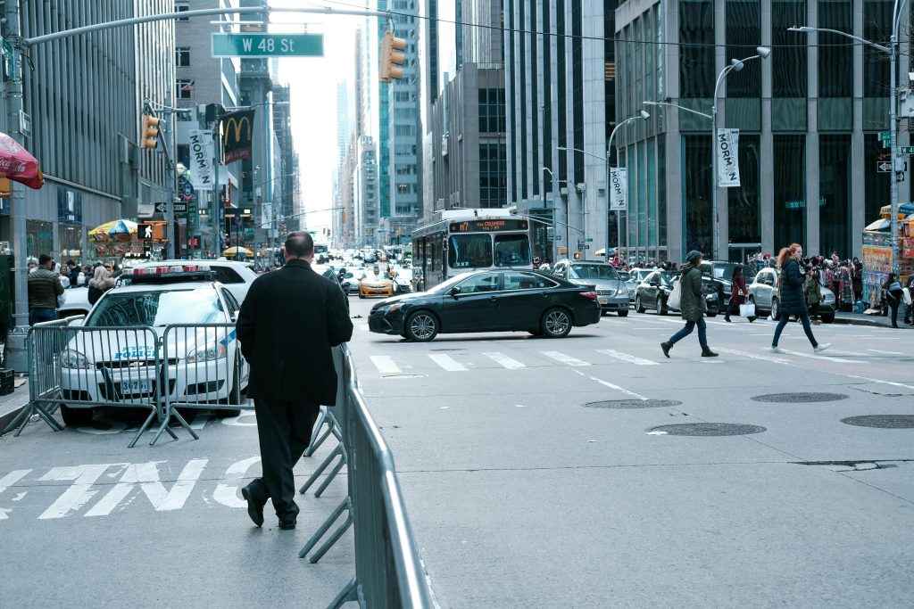 reliable nyc private car service JetBlack black sedan at JFK airport pickup zone