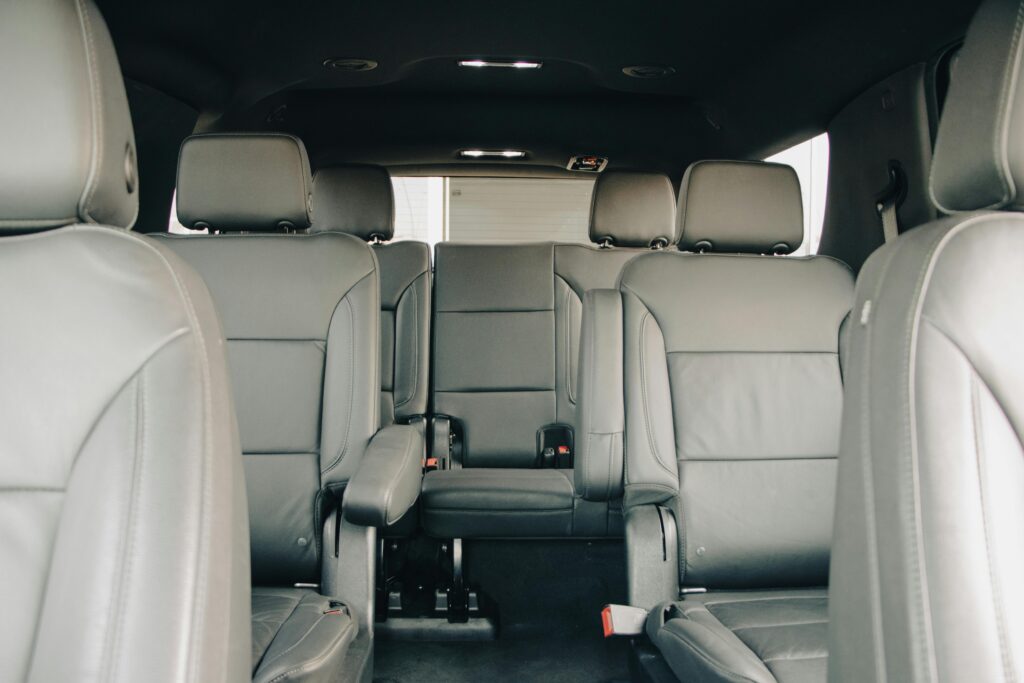 SUV Airport Transportation NYC: 4 Honest Seasonal Truths 2026 7 September 24, 2026 Explore the luxurious empty leather seats of a modern car interior, showcasing spacious design and comfort.