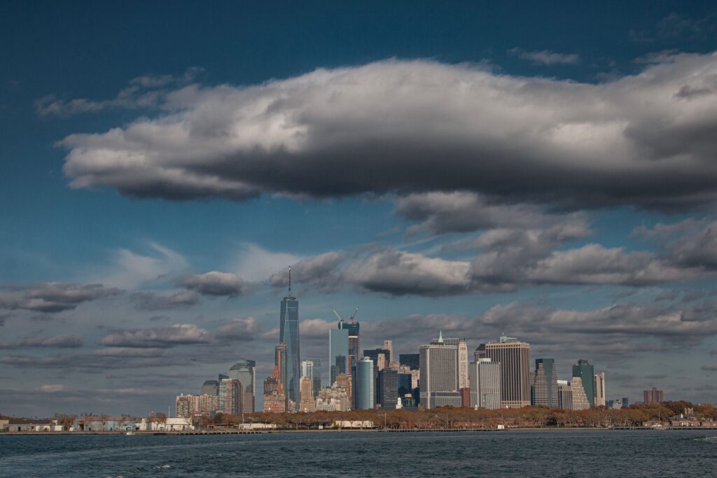 Party Buses in Westchester NY: 7 Honest Facts for 2026 2 September 24, 2026 Dynamic view of New York City's skyline under dramatic clouds, captured in daylight.