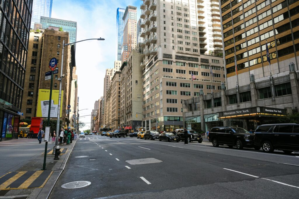 Tel Aviv Limo Service NYC: 6 Honest Facts for First-Time Visitors 2026 3 September 24, 2026 Urban cityscape of Midtown Manhattan with skyscrapers, vehicles, and pedestrians.