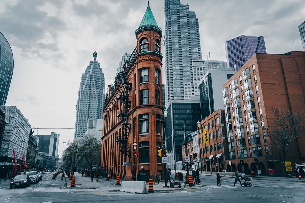 Black Cab in NYC: 3 Honest Family Tests for 2026 1 September 18, 2026 architecture, urban, street, building, photography, winter, cloudy, toronto, canada, city, nature, road, cars, people, sky, classic, season