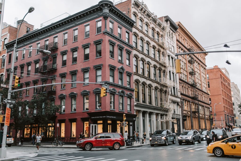 How To Get To Newark Airport From Brooklyn: 5 Honest Ways 1 September 17, 2026 Dynamic Street Scene In Soho, Nyc Showcasing Classic Architecture And Urban Life.