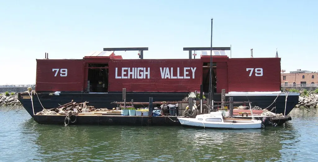 JFK to Red Hook: the Waterfront Museum barge Lehigh Valley 79 moored on the Red Hook waterfront in Brooklyn